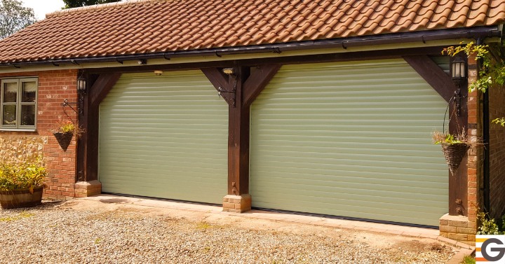 Explore these stunning sage green double garage doors in East Peckham, featuring a traditional timber frame and durable roller shutters. Perfect for enhancing home security and curb appeal.